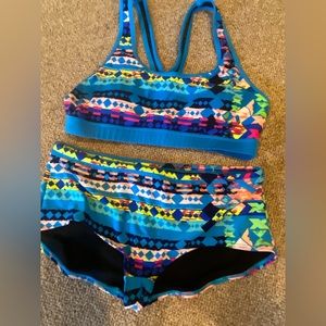 Tyr boy shorts and razor back swimwear